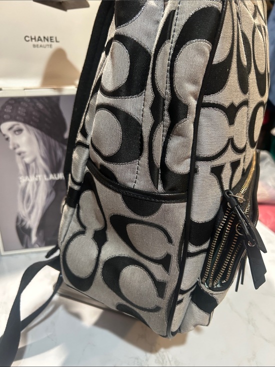 coach black canvas backpack Hadley In Signature it unzips to reveal space for a 16 laptop and multiple pockets for seamless organisation Coach Nylon Backpack - Black